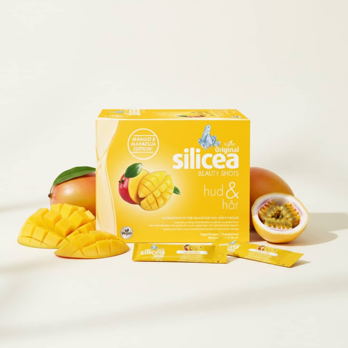 Njut av en daglig shot som vårdar både hud och hår – med smak av mango & maracuja.